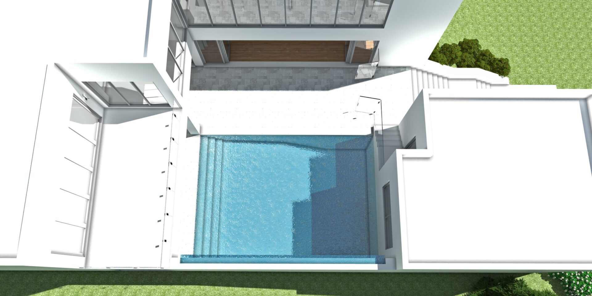 View of pool from above. Limestone by Tyree House Plans.